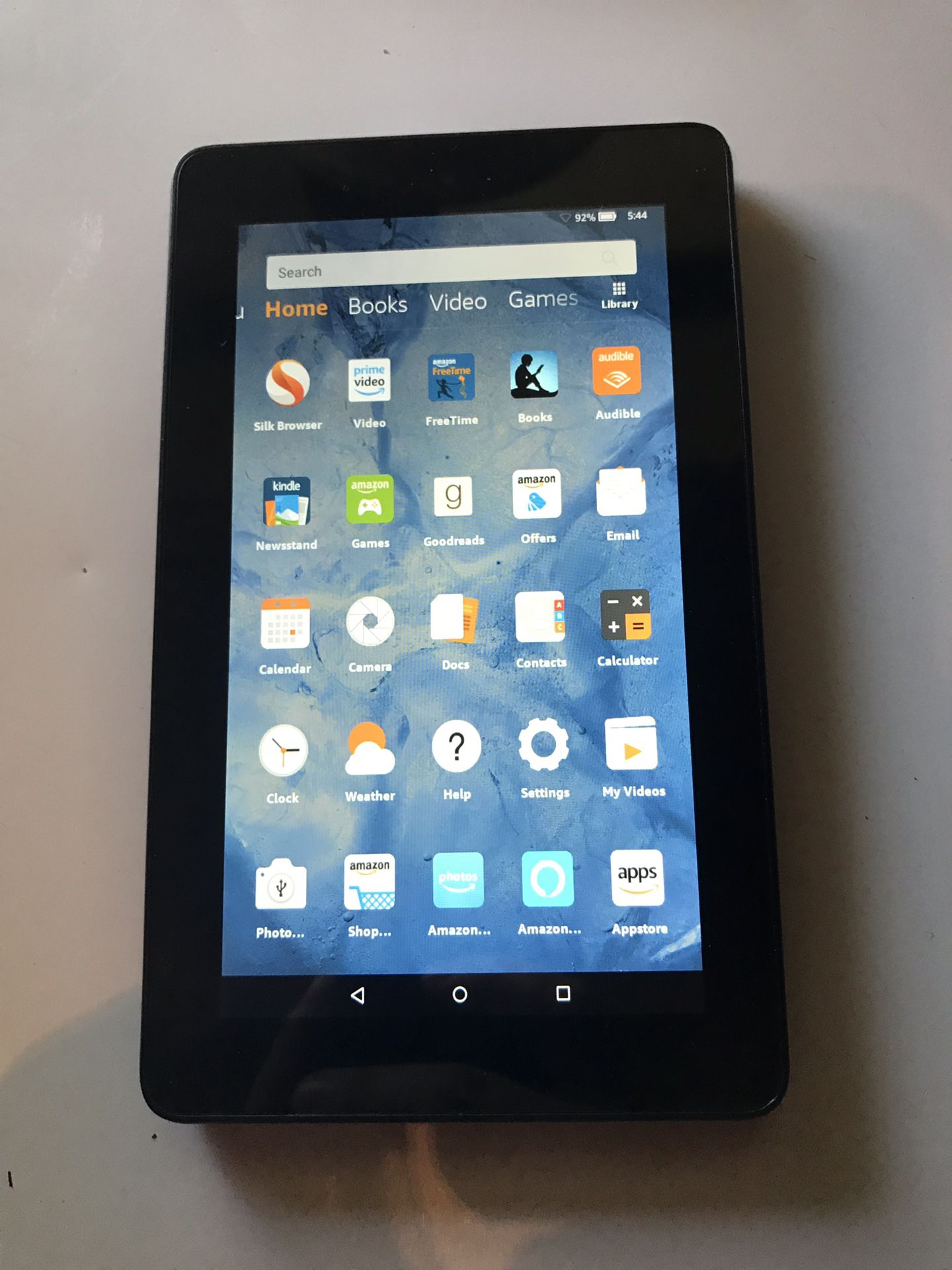 Kindle Fire like new not used much. Trade for iPhone 6s. Comes with case and charger. Perfect condition!