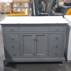 48” sold wood vanity with double ogee marble countertop and porcelain sink
48x22 x34” h