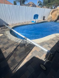 Pool reel and tarp