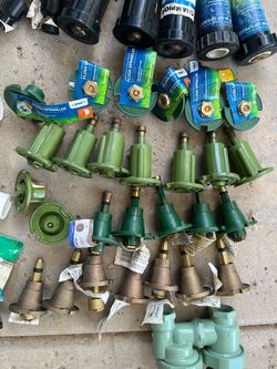 Lot of sprinkler heads and parts