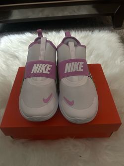 New in box purple nike flex runnner size 3