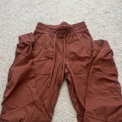 Orange Lululemon joggers