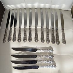 A 16-piece set of authentic Antique Sterling Silver Knives Set. 