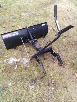 Brand New universal plow asking 300 quad mower John Deere.