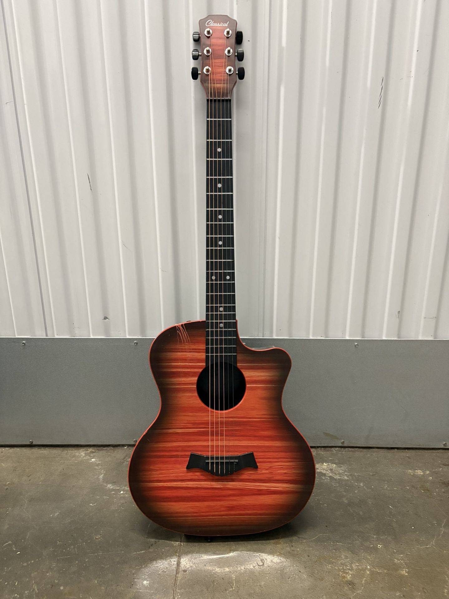 Acoustic Guitar with a sunburst finish