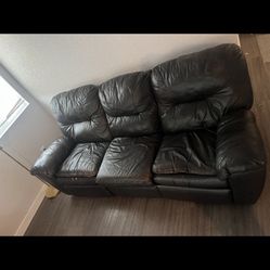 Brown Leather Reclined Couch