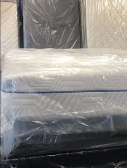 Queen Mattress Still in Plastic Wrap