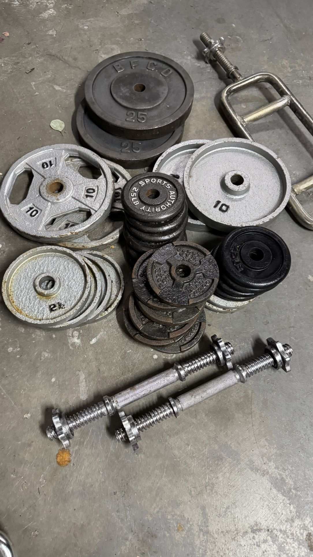 145 Pounds Of Standard Weights With Dumbbell Handles And Tricep Barbell