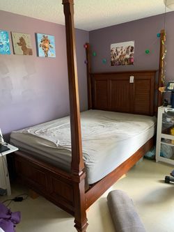 Queen poster bed real wood