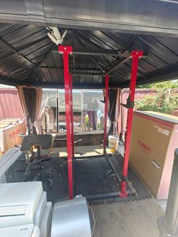 Squat Rack, Adjustable Bench, Barbells, and Weights