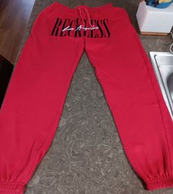 Unisex Young & Reckless red jogger sweatpants w/prominent black graphic on the front size M