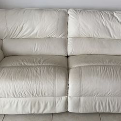 White leather dual reclining sofa and extra wide white leather reclining chair