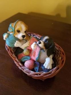 Puppies in a basket