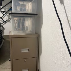 Two drawer file cabinet with key and 2 plastic file boxes.