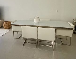 Beautiful modern dining set from the Miami Collection at City Furniture.
