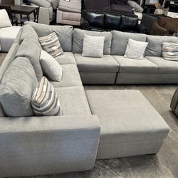 Sectional Soda With Ottoman And Accent Pillows