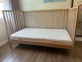 Ikea Crib/Bed, with guard rail and Newton Mattress.