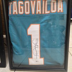 Tua Tagovalioa Miami Dolphins Autographed Jersey With Frame and Beckett COA