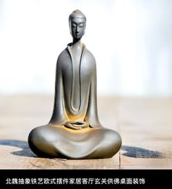 cast iron Buddha statue
