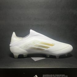 Adidas white and gold cleats