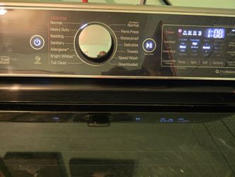 LG Washer model WT7700HVA works 200.00