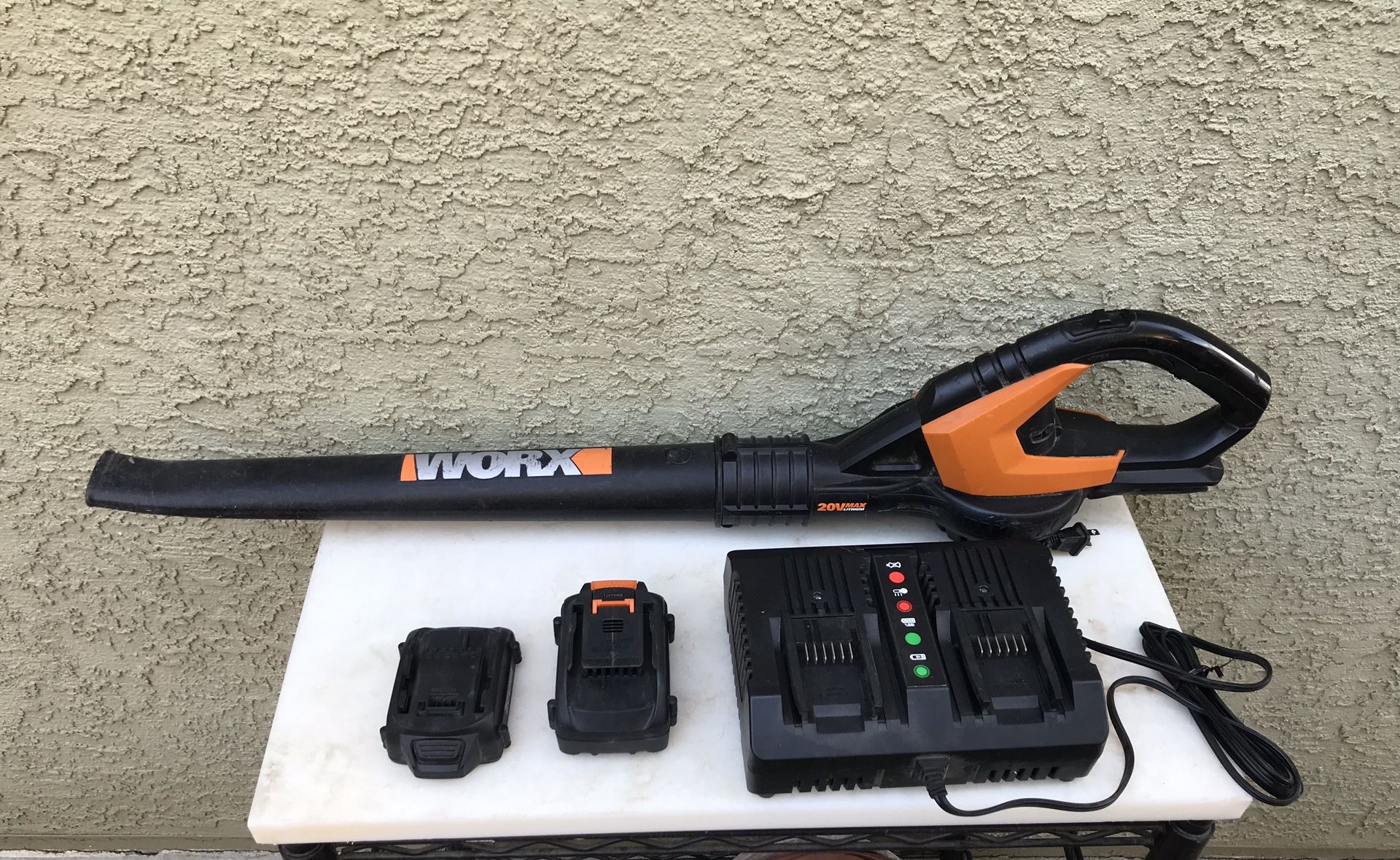 WORX cordless blower with 2 batteries and charger
