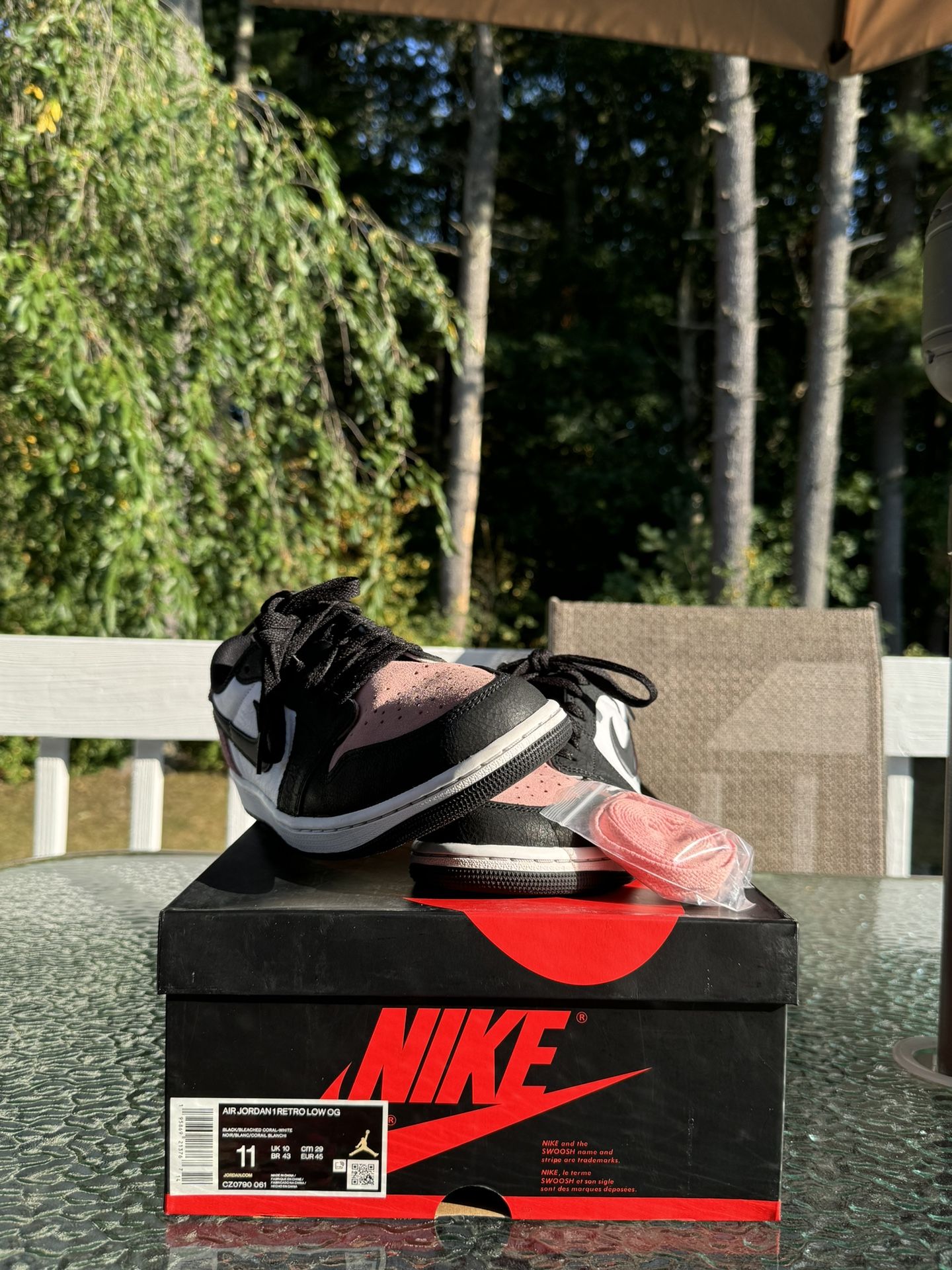 Bleached Coral white Jordan 1 Lows OG Box