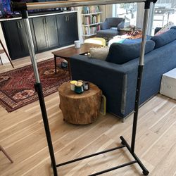 Adjustable Rolling Clothing Rack