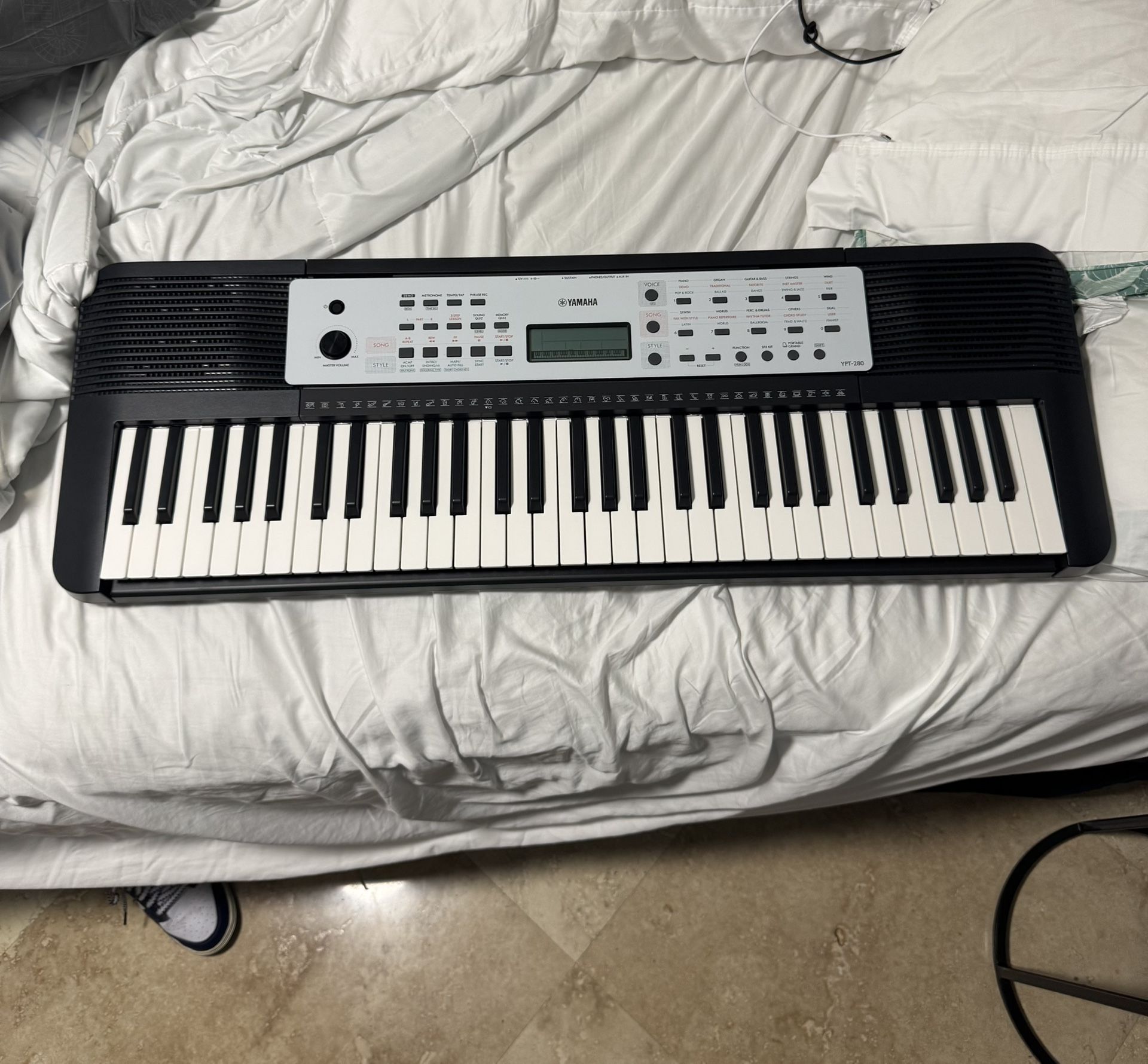 Yamaha Piano keyboard. In Excellent Shape, Does Not Come With Stand But Comes With Original Box And Everything.