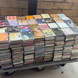 Massive Lot of 1,000–1,500 CDs + Some PC Games – Mixed Genres – $150 