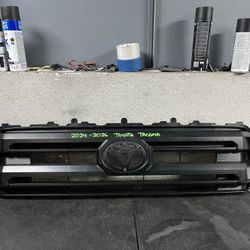 2024-2025-2026 TOYOTA TACOMA GRILL OEM USED #9071