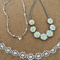Bundle Of 3 Necklaces Take All 3 For Price Listed. Boho Style Jewelry. Lace Choker  Adjustable, Daisy Chunky Necklace And Beaded Pink Butterfly Neckla