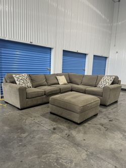 Gray Sectional With Ottoman