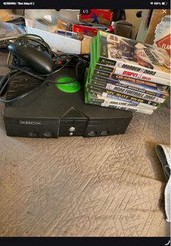 Original XBOX system with cords and 1 controller and 9 games.