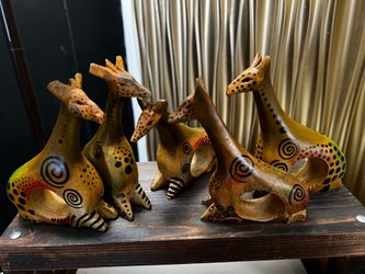 wooden giraffe family