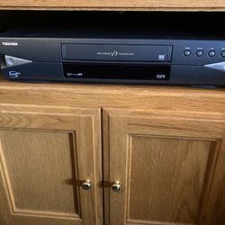 VHS Player With VHS Tapes