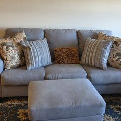 Comfy gray sofa and ottoman set