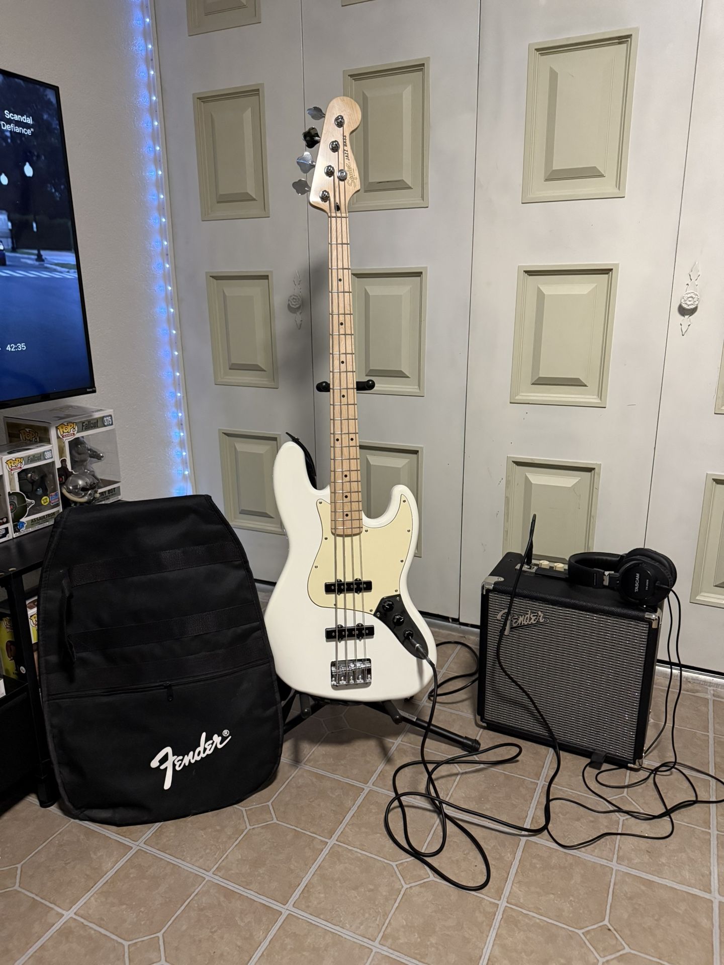 Brand New Fender Squire Jazz Bass Package $300 Also comes with headphones and bass stand.