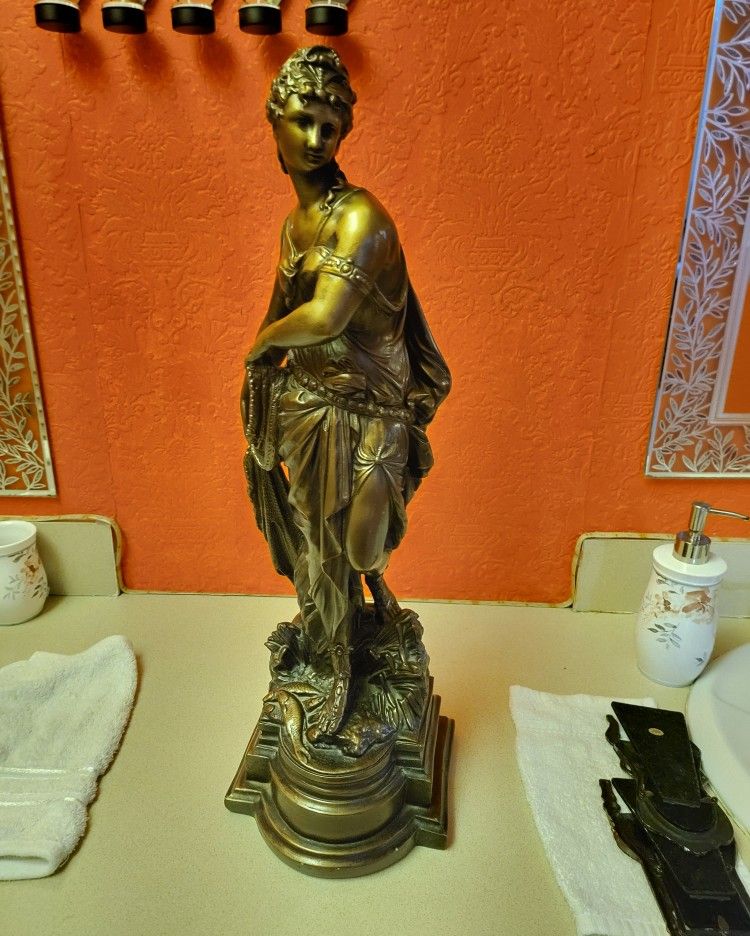 Estatua de bronce 