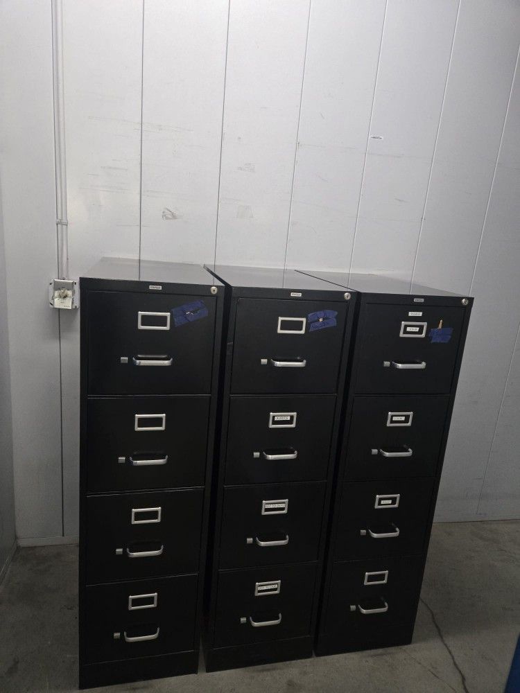 Metal File Cabinet  $ 80 Each 