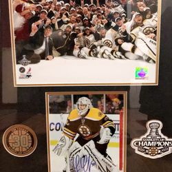 Framed Autographed Picture Signed By Boston Bruins Player Tim Thomas From When They Won The Championship. 26 3/4”x 22 3/4”