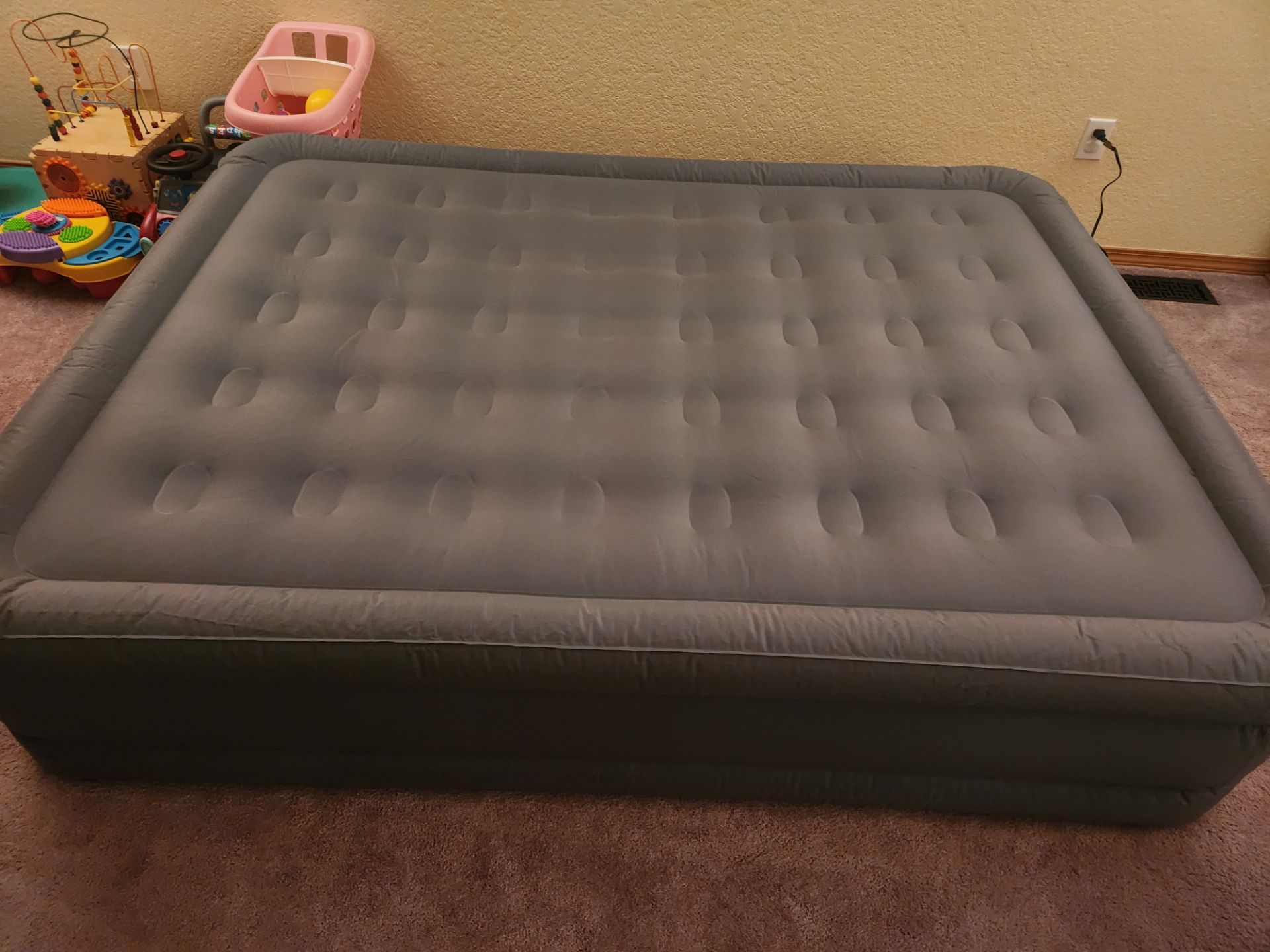 Queen sized air mattress with built in pump