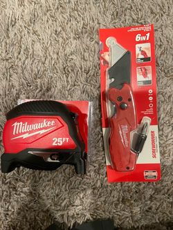 Milwaukee fastback knife and 25ft tape measure