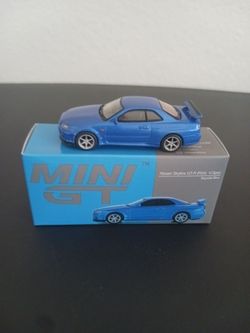 Diecast models Nissan Skyline GT-R (R34) V-Spec Bayside Blue by Mini GT