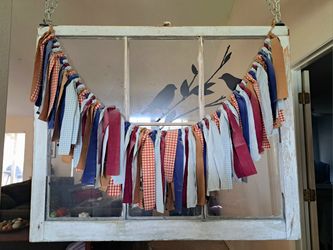 Repurposed vintage window 34"x28" with vinyl bird decoration and fabric garland. Hanging hardware included. Apopka Pick-Up.
