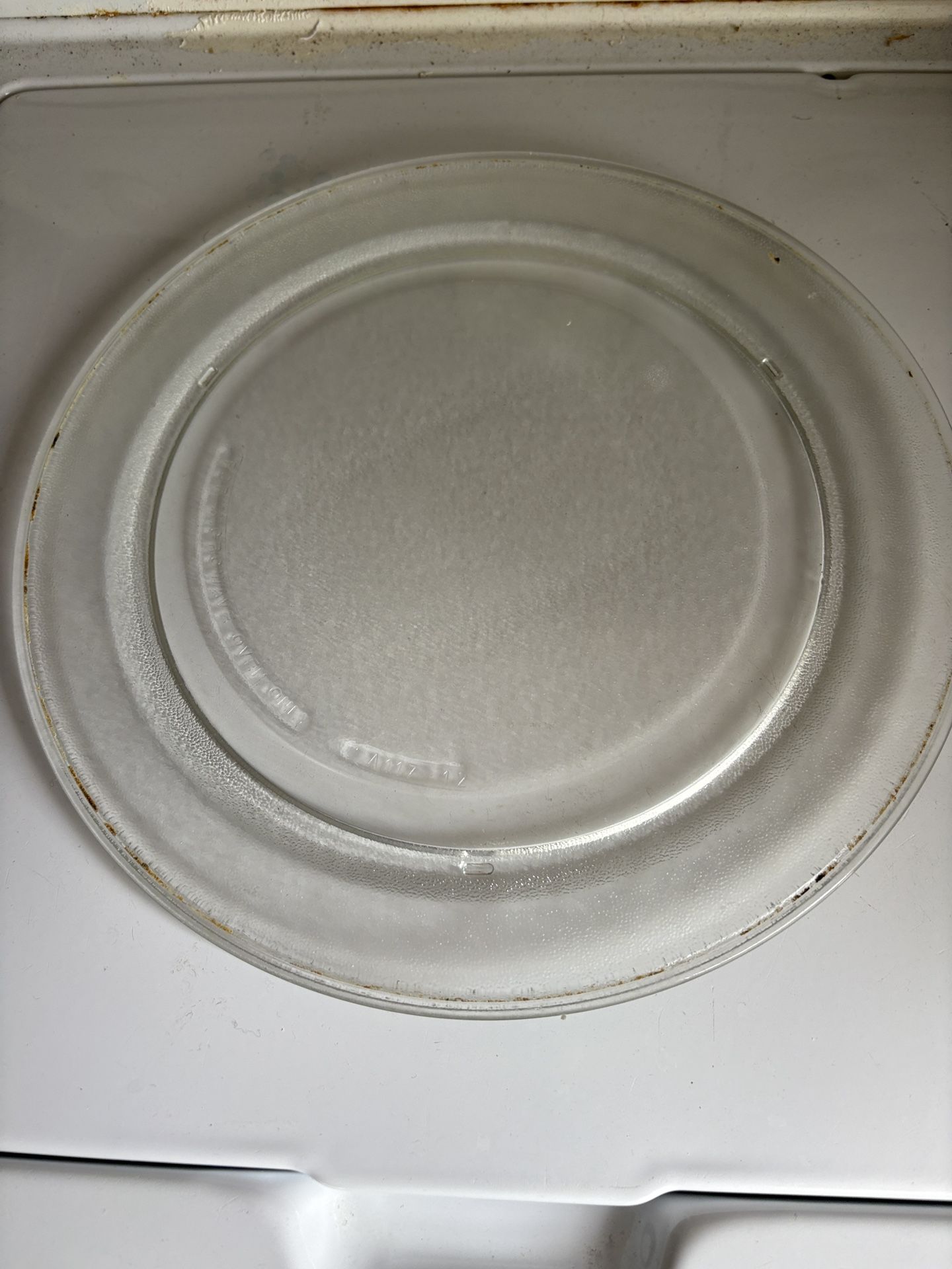 Glass microwave dish for inside a microwave oven oven