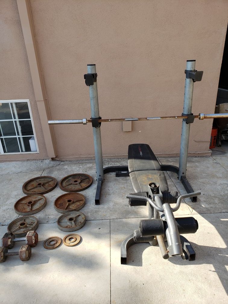 Bench, weights, bar, dumbell, and rack