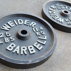WEIDER BARBELL PLATES 50LBS - 2 PLATES OF 25 LBS. EACH THE HOLE IS OF 1 INCH 