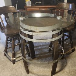 Barrel Table And Two Chairs