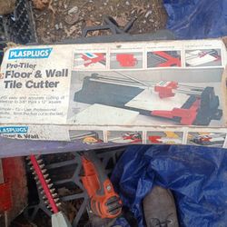 Floor And Tile Cutter With Carpet Kicker